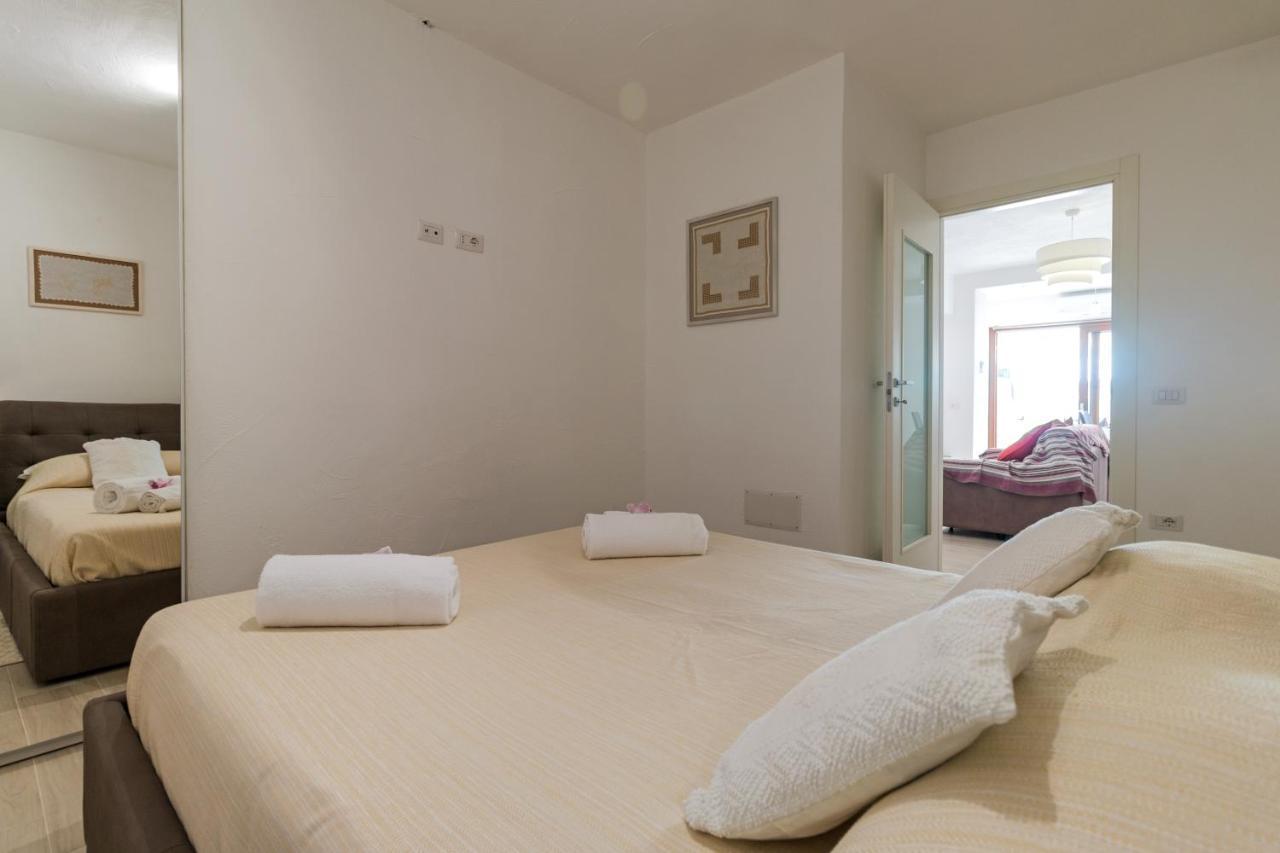 Purple Flower Suite Apartment Кала-Гононе Экстерьер фото
